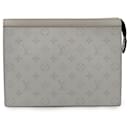 Louis Vuitton Taiga Pochette Voyage MM Clutch
