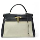 BOLSA DE MÃO HERMES KELLY 32 RETORNADA 1953 EM CANVAS E COURO PRETO - Hermès