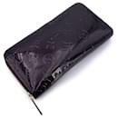 Louis Vuitton Patent leather Wallet Zippy