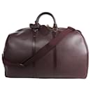 Louis Vuitton Taiga GM Kendall Travel bag in Burgundy