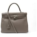 BOLSA DE MÃO HERMES KELLY 35 EM COURO RETORNADO COM ALÇA DE OMBRO - Hermès