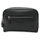 Gucci Microguccissima Leather Clutch Bag