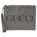 Gucci GG Supreme Clutch Bag
