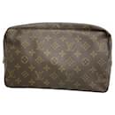 Louis Vuitton Monogram True Toilet Wallet 28
