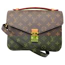 Bolsa Pochette Metis em lona revestida monograma marrom Louis Vuitton