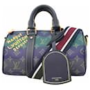 Louis Vuitton Monogram Heritage Keepall Bandouliere 25 Handbag