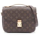 Bolsa de mão Louis Vuitton Metis MM Pochette