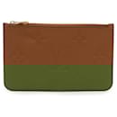 Pochete Monogram Empreinte Louis Vuitton