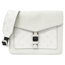 Louis Vuitton Taiga Lama Flap Messenger Coated Canvas Shoulder Bag