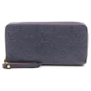 Louis Vuitton Monogram Empreinte Leather Zippy Wallet