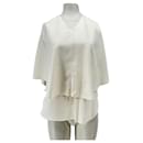 Beige short-sleeve blouse 'Arona' - Autre Marque