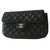 Chanel Bolsa de embrague Negro Cuero  ref.24811