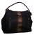 Yves Saint Laurent Handbag Black Golden Leather  ref.30091