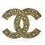 Chanel Pin y broche Dorado Metal  ref.36546
