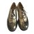 Chanel Lace ups Golden Patent leather  ref.50684