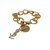 Yves Saint Laurent Pulseira de charme Dourado Metal  ref.50711