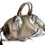Prada Handbags Beige Cloth  ref.51775