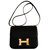 Hermès Constance 18cm in pelle nera Evercalf con hardware dorato Nero  ref.65220