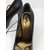 Escarpins Yves Saint Laurent en cuir noir et bout doré 10,5 cm  - vue 9
