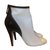 Chanel Ankle boots Black White Eggshell Patent leather Cloth  ref.83544