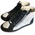 Chanel Sneakers stringate in camoscio nero e tela bianca Bianco Svezia  ref.84128