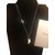 Dior pendant necklace Silvery Eggshell Metal  ref.93300