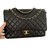 Timeless Chanel Maxi Jumbo black Leather  ref.103438