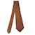 Hermès Superbe cravate HERMES en soie imprimée couleur Orange aux motifs géométriques, état neuf !  ref.108589