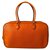 Hermès Feder Orange Leder  ref.116373