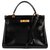 Hermès hermes kelly 32 returned in black box leather with shoulder strap, in excellent condition!  ref.121025