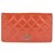 Chanel Geldbörse aus korallenfarbenem gestepptem Lackleder, richtiger Zustand!  ref.129032