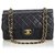 Timeless Chanel Black Classic pequeno couro de pele de carneiro forrado Flap Bag Preto  ref.129951