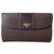 Yves Saint Laurent Clutch bags Brown Orange Leather Cloth  ref.136198