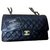 Timeless Chanel black caviar médio clássico flap bag GHW Preto Couro  ref.140922