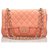 Timeless Borsa a patta Chanel classica foderata in pelle di agnello media arancione  ref.160066