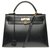 Hermès Hermes Kelly 32 correa de hombro de cuero de caja negra, Ribete de metal chapado en oro en excelentes condiciones. Negro  ref.169179