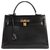 Saddleler Hermès Kelly 32 cm caja de cuero negro, adorno chapado en oro  ref.170257