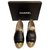 Chanel Dallas Mocasines De Cuero Zapatos Sz 37 Negro Dorado  ref.198861