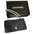 Bolsa Chanel em tweed preto e branco e aba de pele de carneiro Lona  ref.200573