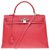 Superbe et Rare Sac Hermès Kelly 35 bandoulière en cuir Togo rouge à coutures sellier, garniture en métal plaqué or  ref.203790