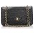 Chanel Preto Clássico Médio Pele de carneiro Flap Bag Couro  ref.205319