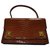 Hermès piano Brown Exotic leather  ref.212434