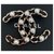 Chanel Grande broche en métal avec logo CC en cuir d'agneau noir pâle chaîne  ref.215219