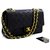 Chanel 2.55 solapa forrada 10Bolso de hombro con cadena de piel de cordero negro Cuero  ref.218993