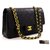 Chanel 2.55 sac à bandoulière à chaîne moyenne à rabat doublé en cuir d'agneau noir  ref.220326