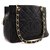 CHANEL Bolso de hombro con cadena de caviar Bolso de compras Bolso acolchado negro Cuero  ref.221294