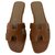 Hermès HERMES ORAN FLAT SANDALS BRAND NEW Brown Leather  ref.221495