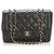 Bolso Chanel mediano de piel de cordero negra con solapa Negro Cuero  ref.223966