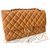 Chanel mediano Timeless clásico bolso de solapa forrado Caramelo Cuero  ref.224847