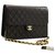 CHANEL Chain Shoulder Bag Clutch Black Quilted Flap Lambskin Purse Leather  ref.226450